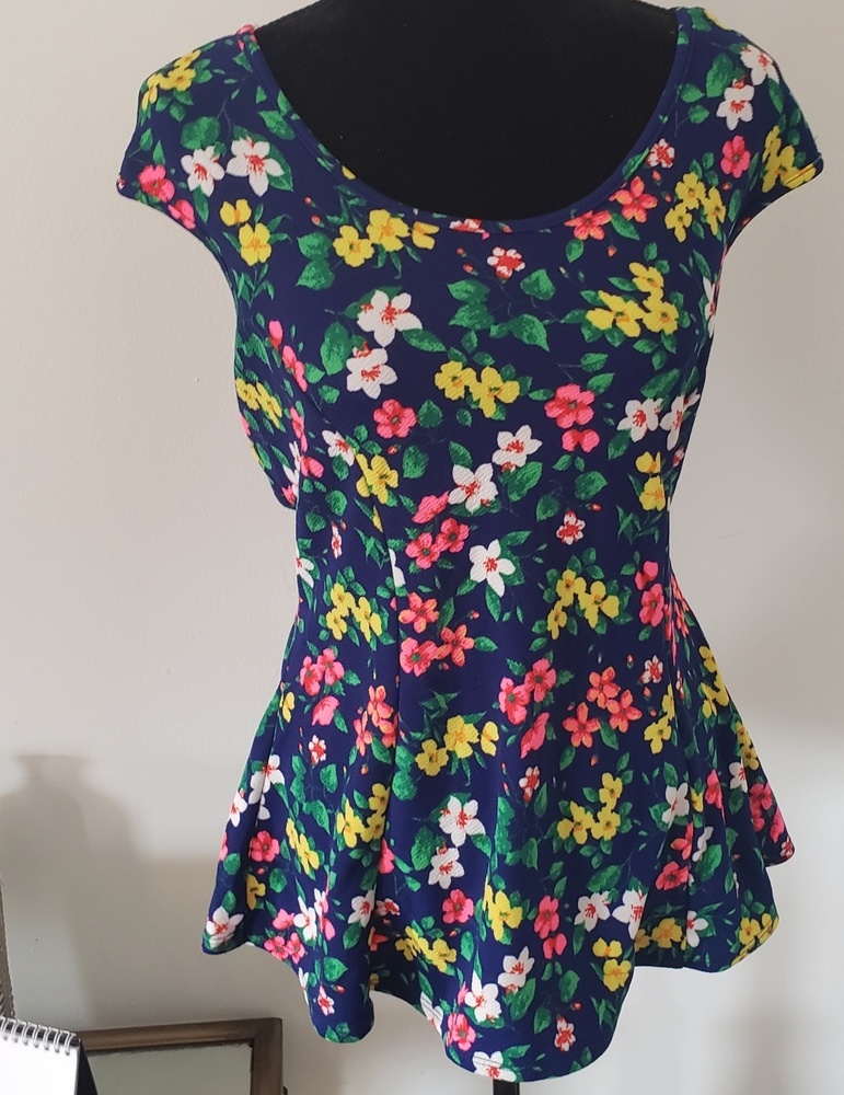 Peplum top with bright flowers NWOT